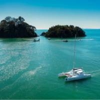 Cruising through the stunning bays of the Abel Tasman by Catamaran.