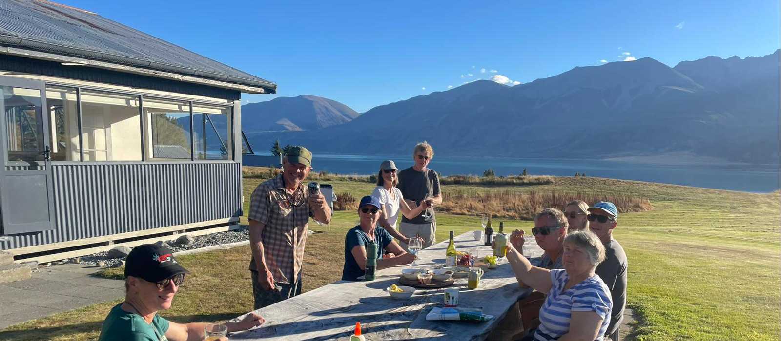 Cycling along Lake Pukaki on the Alps to Ocean End to End with Adventure South. | Guide Collie