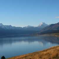 Cycling along Lake Pukaki on the Alps to Ocean End to End with Adventure South. | Guide Collie