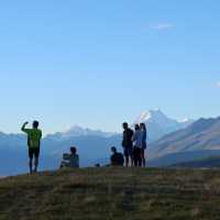Cycling along Lake Pukaki on the Alps to Ocean End to End with Adventure South. | Guide Collie