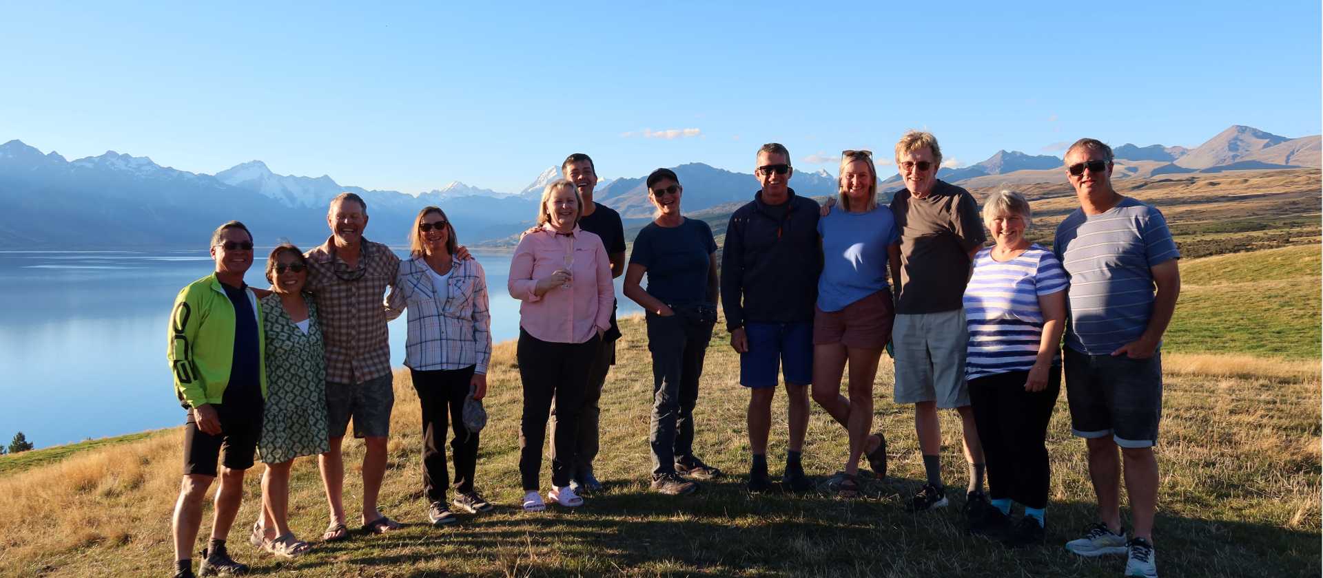 Cycling along Lake Pukaki on the Alps to Ocean End to End with Adventure South. | Guide Collie