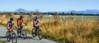 Cycling through Lumsden on the Around the Mountains trail | Great South
