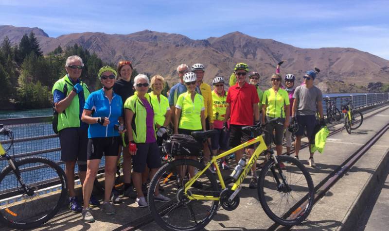 Enjoying a quick break on one of the may hydro dams on the Alps 2 Ocean Cycle Trail |  <i>Sue Wills</i>