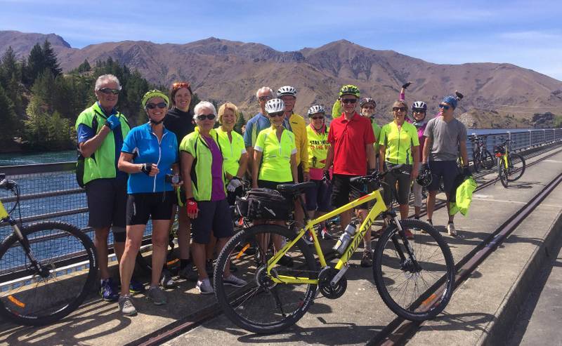 Enjoying a quick break on one of the may hydro dams on the Alps 2 Ocean Cycle Trail |  <i>Sue Wills</i>