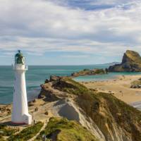 Incredible rocky coastline and lighthouse at Castle Point | Sandra Appleby