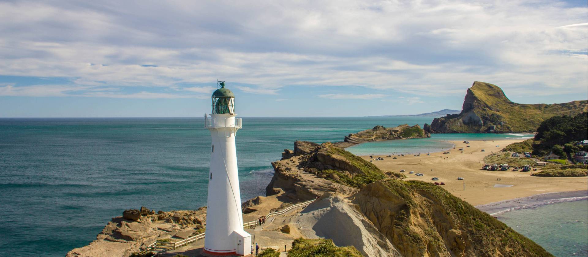 Incredible rocky coastline and lighthouse at Castle Point | Sandra Appleby