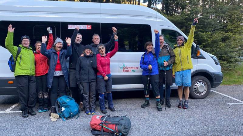 Tired, but accomplished bodies celebrating the completion of Goat Pass |  <i>Adventure South NZ</i>