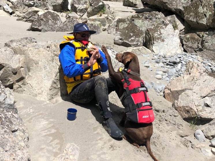 Hunter the dog entertaining us on the raft down the Waimakariri Gorge |  <i>Adventure South NZ</i>