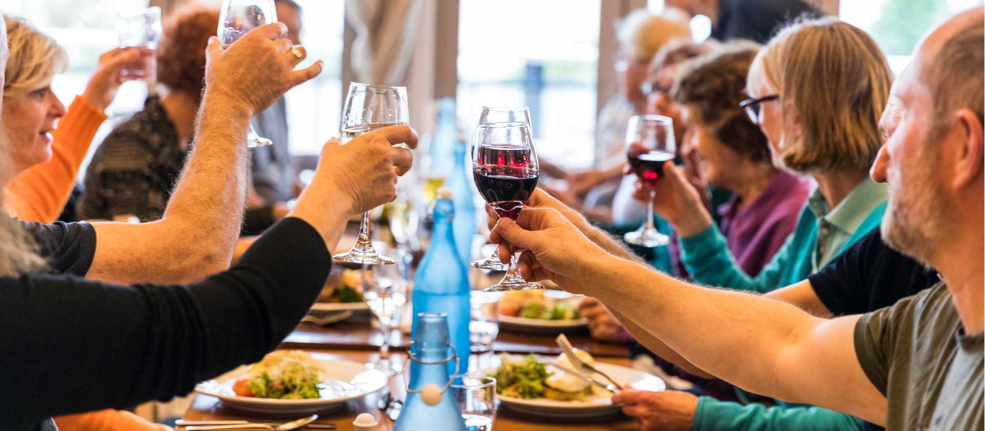 Celebrating with fine food and wine after a good day's ride | Lachlan Gardiner