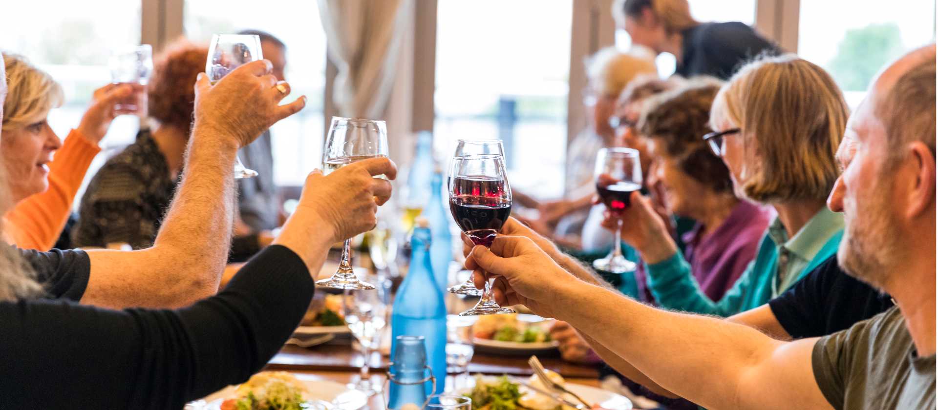 Celebrating with fine food and wine after a good day's ride | Lachlan Gardiner