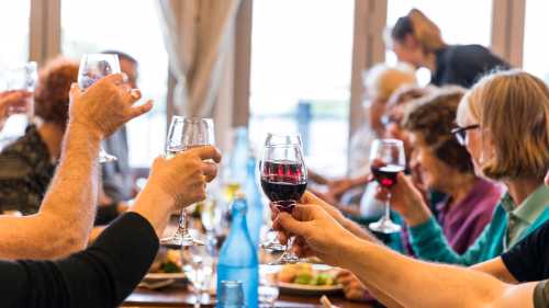 Celebrating with fine food and wine after a good day's ride | Lachlan Gardiner