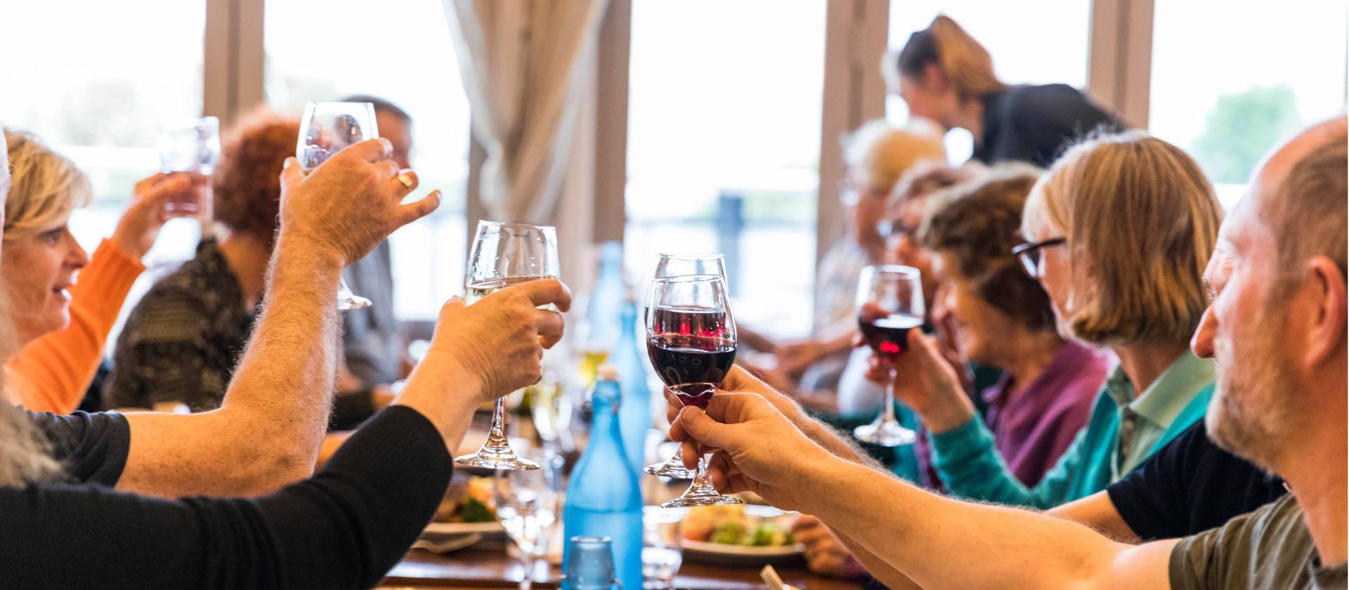 Celebrating with fine food and wine after a good day's ride | Lachlan Gardiner