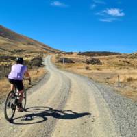 Uphill gravel riding on South Island Explorer | Hana Black