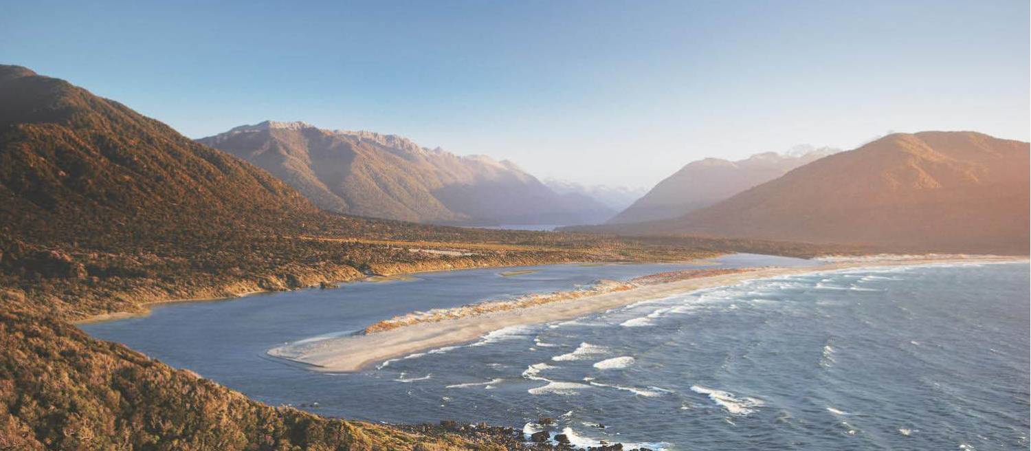 Aerial view over Long Reef and Martin's bay on the Fiordland, Hollyford and Stewart Island Trek | Hollyford Track