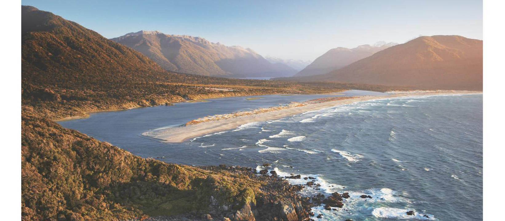 Aerial view over Long Reef and Martin's bay on the Fiordland, Hollyford and Stewart Island Trek | Hollyford Track