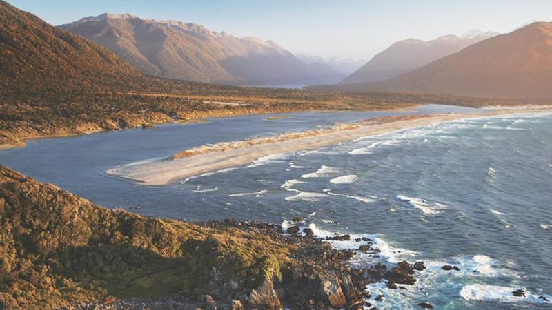 Aerial view over Long Reef and Martin's bay on the Fiordland, Hollyford and Stewart Island Trek |  <i>Hollyford Track</i>