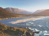 Aerial view over Long Reef and Martin's bay on the Fiordland, Hollyford and Stewart Island Trek |  <i>Hollyford Track</i>