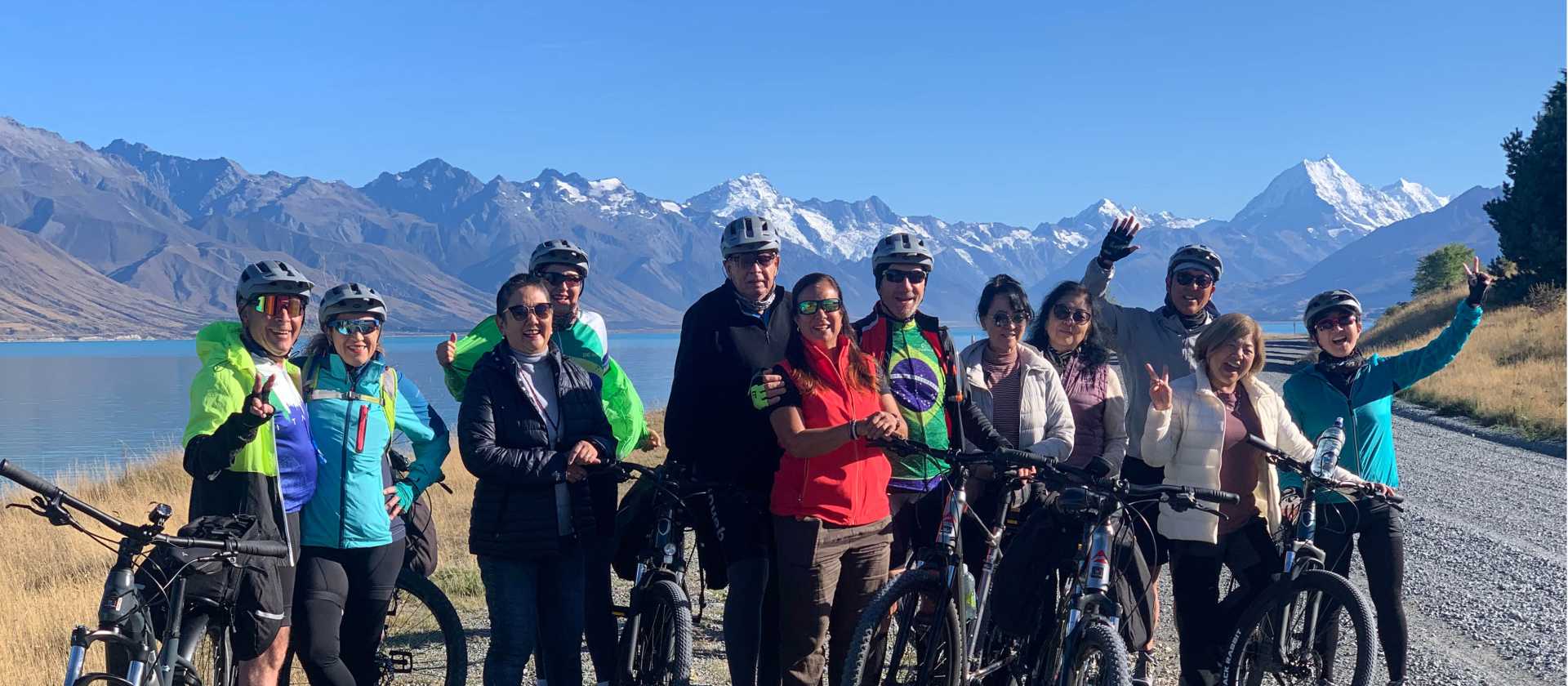 Happy cyclists on the Alps to Ocean trail