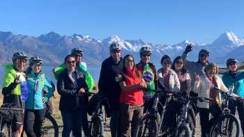 Happy cyclists on the Alps to Ocean trail