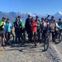 Happy cyclists on the Alps to Ocean trail