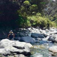 Climbing over boulders in Goat Pass, NZ | Lisa Jones