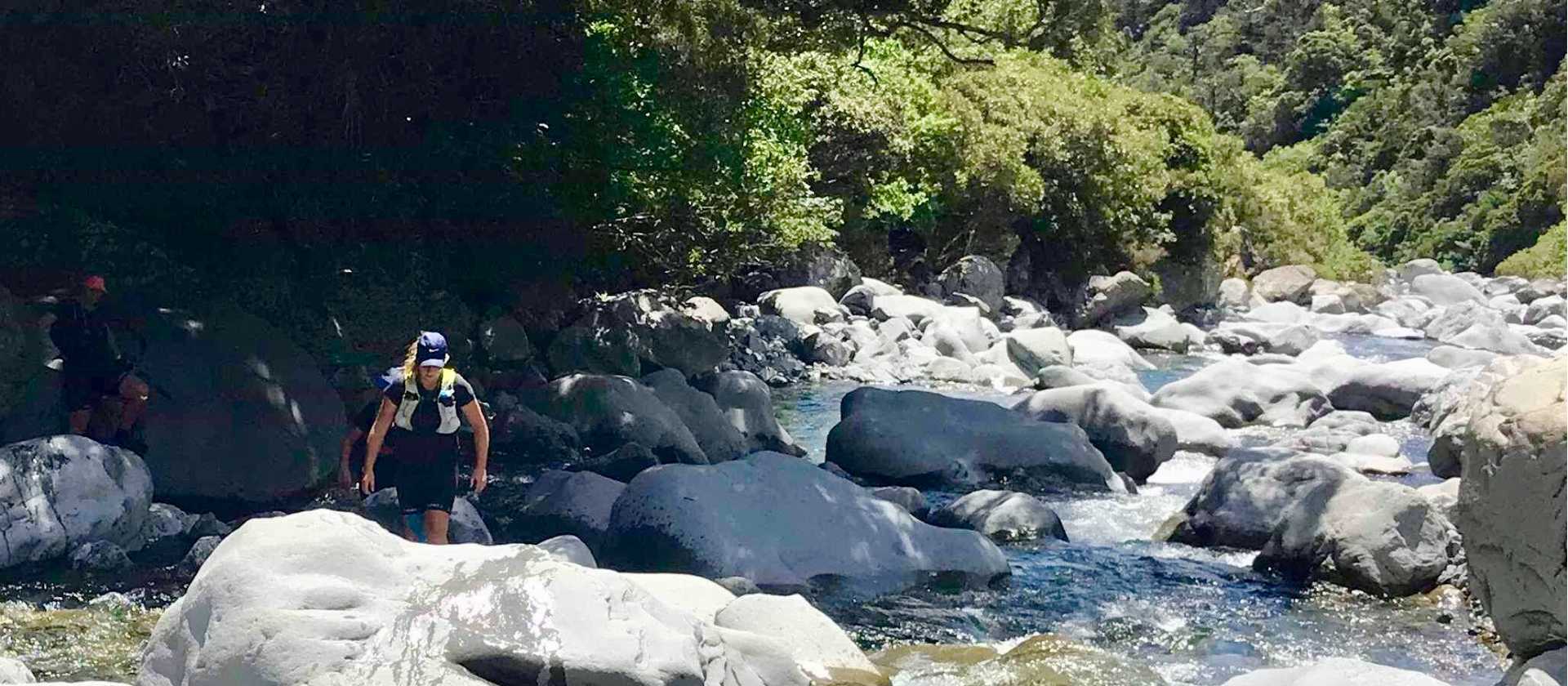 Climbing over boulders in Goat Pass, NZ | Lisa Jones