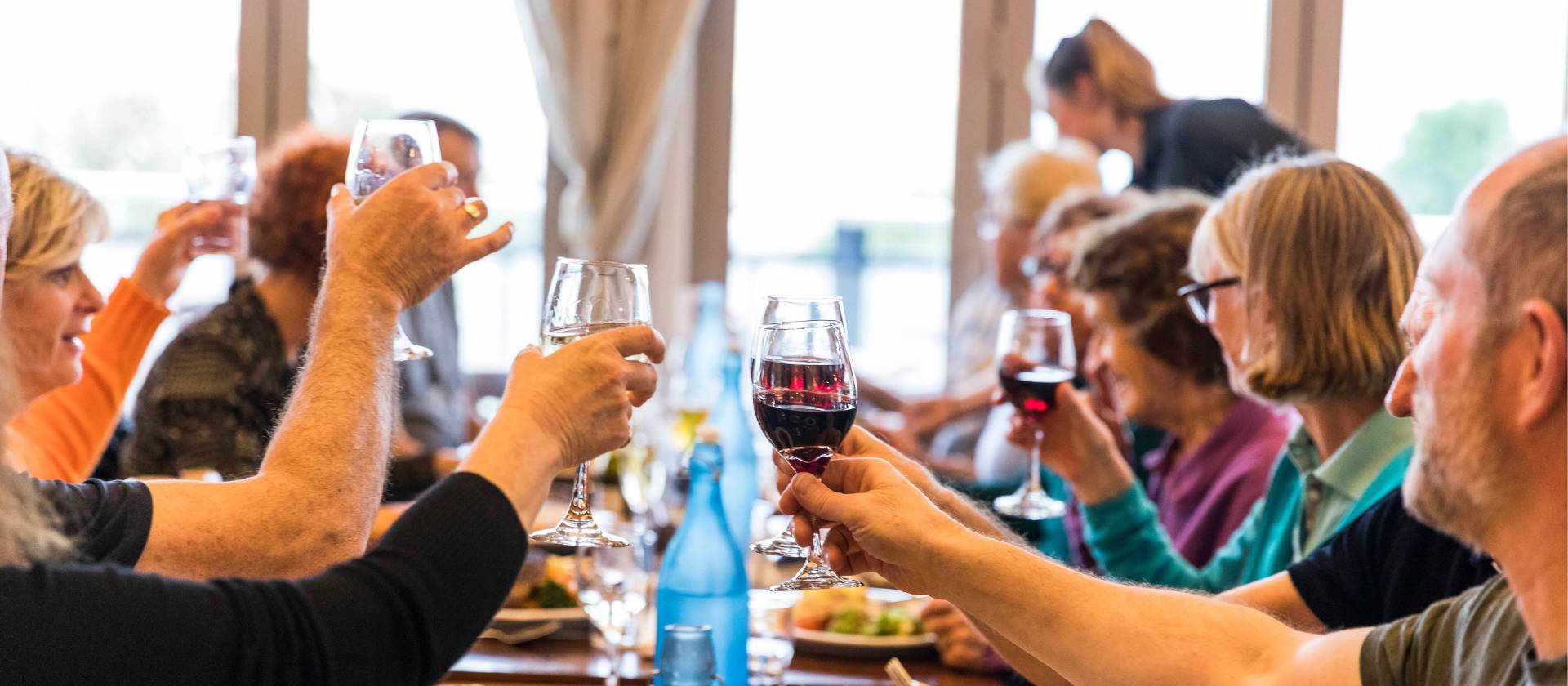 Celebrating with fine food and wine after a good day's ride | Lachlan Gardiner