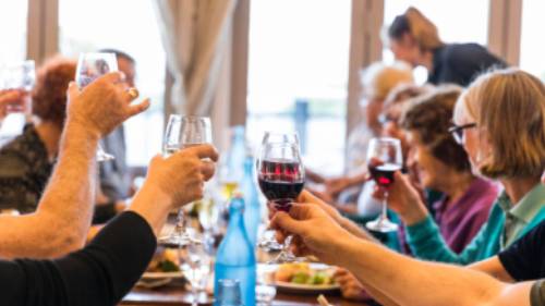 Celebrating with fine food and wine after a good day's ride | Lachlan Gardiner