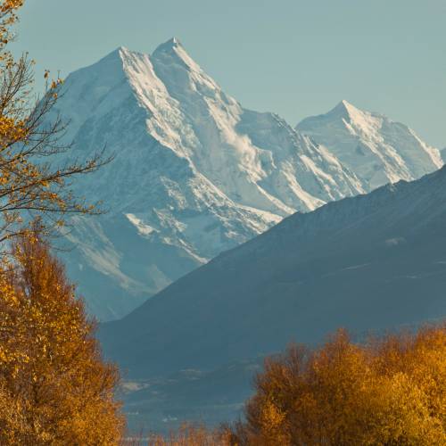 Cyclists on Alps to Ocean bike trail heading away from Mt Cook