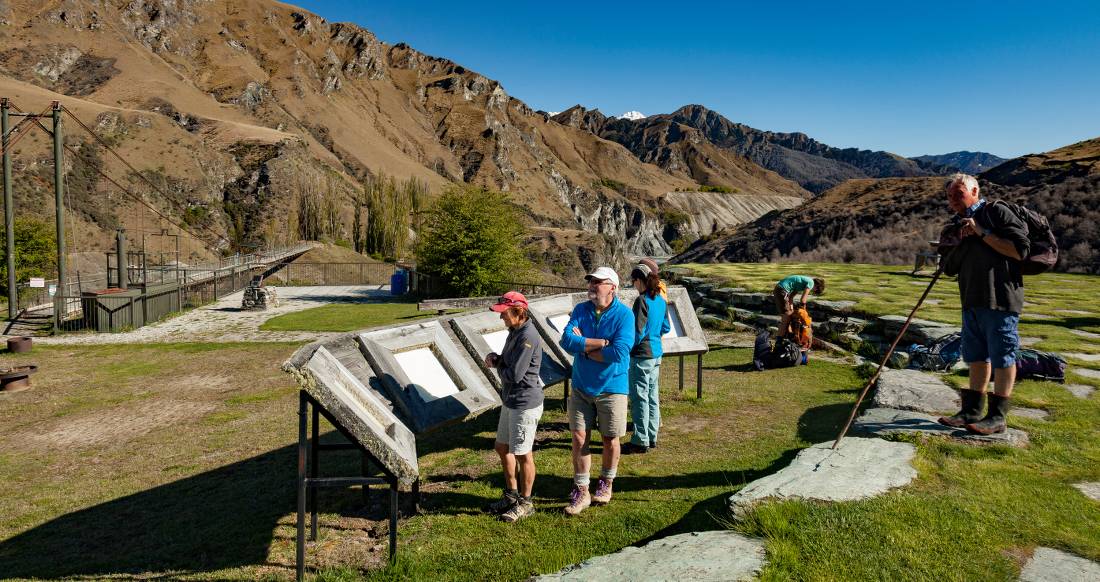 Reading about the mining history on the Moonlight Track |  <i>Colin Monteath</i>