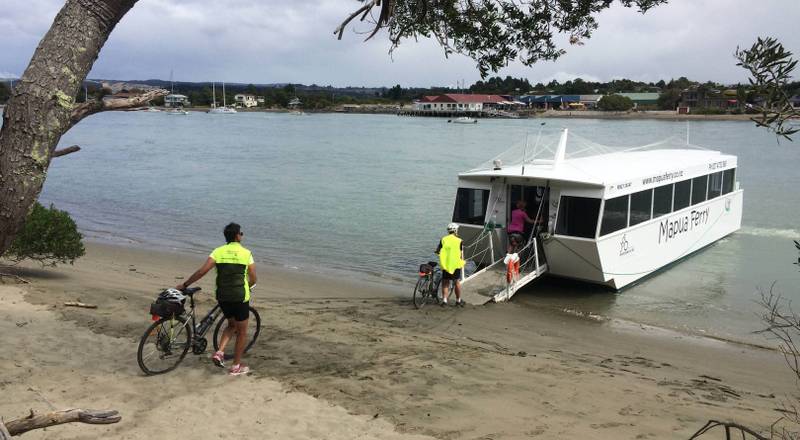 Boarding the Mapua Ferry after a stunning ride on Rabbit Island |  <i>Chris Cameron</i>