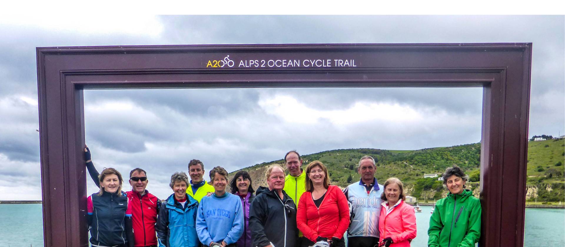 Cycle Group at the finish line of the Alps 2 Ocean | Ross Dunn
