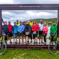 Cycle Group at the finish line of the Alps 2 Ocean | Ross Dunn