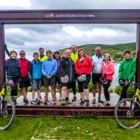 Cycle Group at the finish line of the Alps 2 Ocean | Ross Dunn