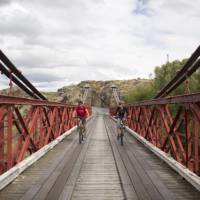 Cycling over the Ophir railway bridge | Tom Powell