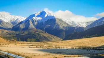 Glide through the towering Tiritiri-o-te-moana / Southern Alps aboard the TranzAlpine — a spectacular prelude to your West Coast cycling journey. | Jay French