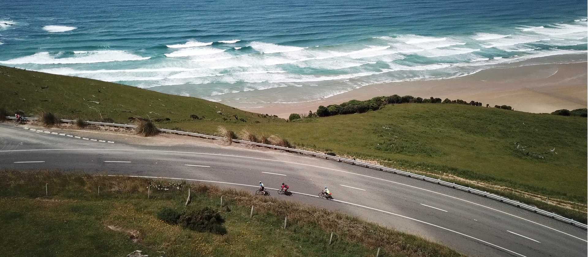 Road cyclists making their way around Papatowai Beach | Reiner Schuster