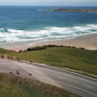 Road cyclists making their way around Papatowai Beach | Reiner Schuster