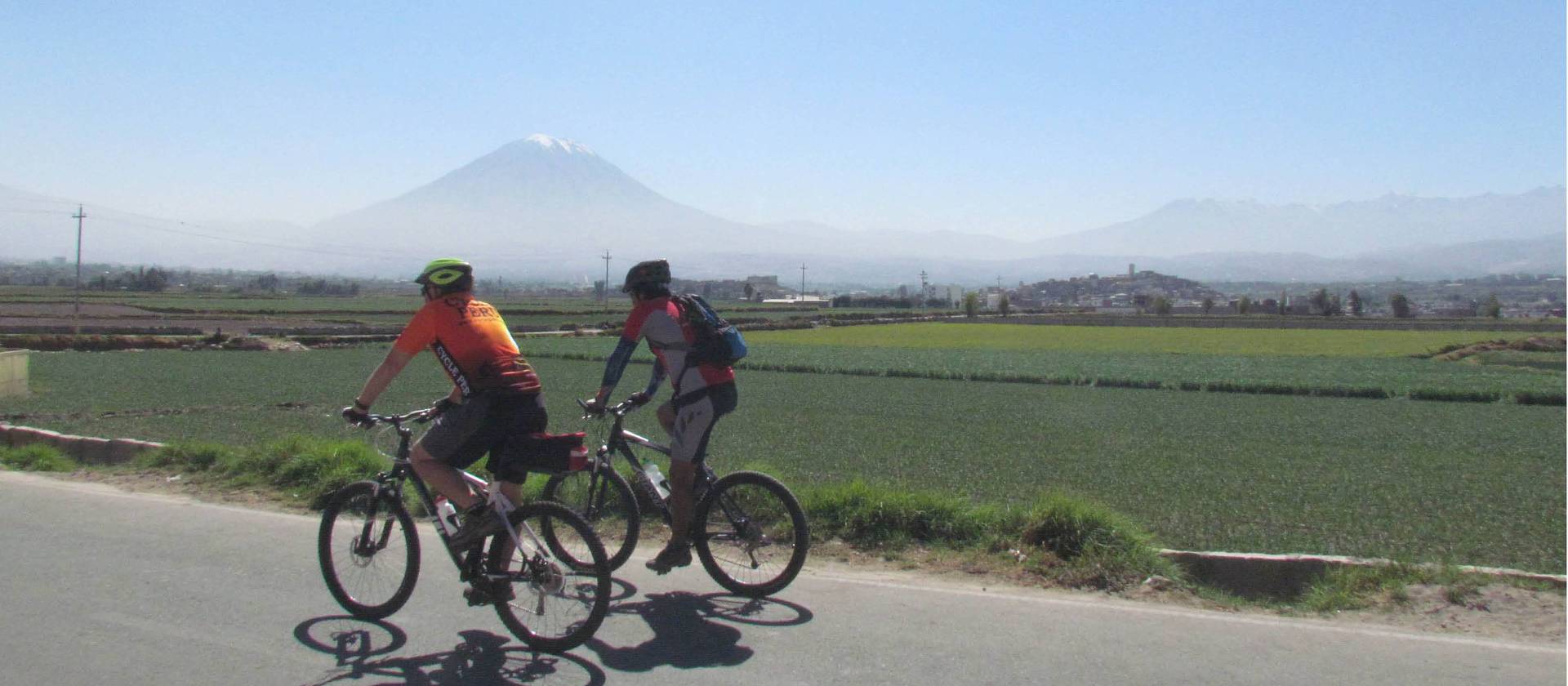 Cycling on quiet rural roads near Arequipa, El Misti towering in the background | Louise Vargaya Conza