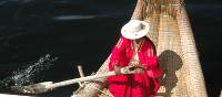 A lady of the Uros Islands, on Lake Titicaca in Peru. | Sarah Higgins